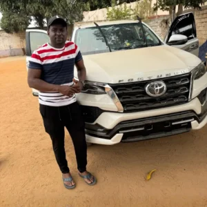 Happy customer after receiving exported vehicle from Dubai through Mobeen Auto Export