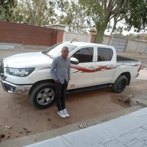 Happy customer after receiving exported vehicle from Dubai through Mobeen Auto Export
